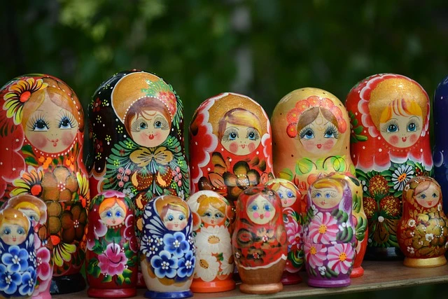 Nesting dolls, russian traditions, russian culture related to (stacked|nesting) (boxes|dolls) wooden